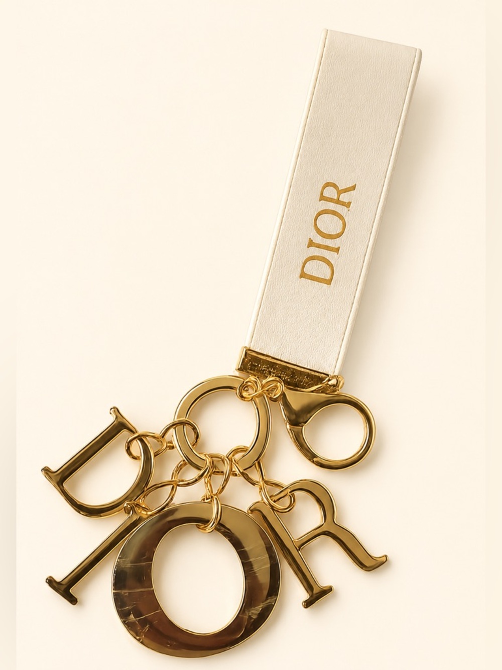 Christian Dior Champagne Gold Letter Bag Charm Keychain w/ Embroidered Ribbon